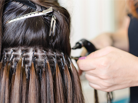 Ihr Weg zu vollem Haar: Haarverlängerungen in Frankfurt